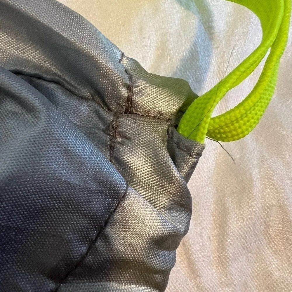 Athletta girl silver and neon green  cinch sack. Used, but life left in it.